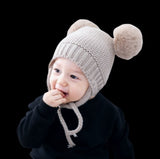 Double pom pom tie up beanie for baby and toddler