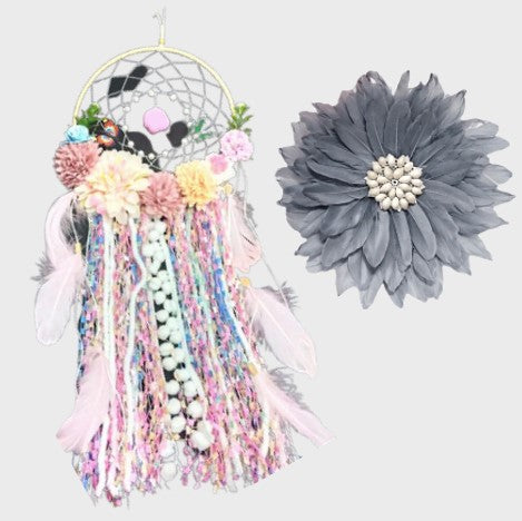 Floral dream catcher with pom poms and feathers - kids wall decor