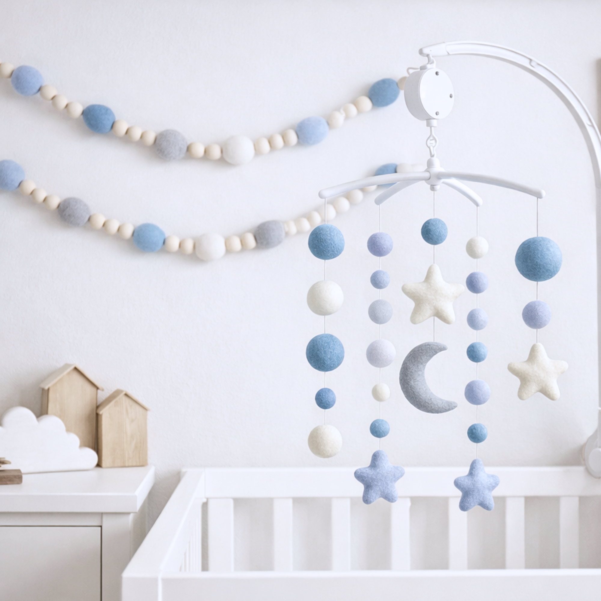 Pom pom garland and mobile set for baby room décor and calming environment