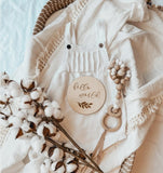 Tassel fringed boho baby swaddle in SAND